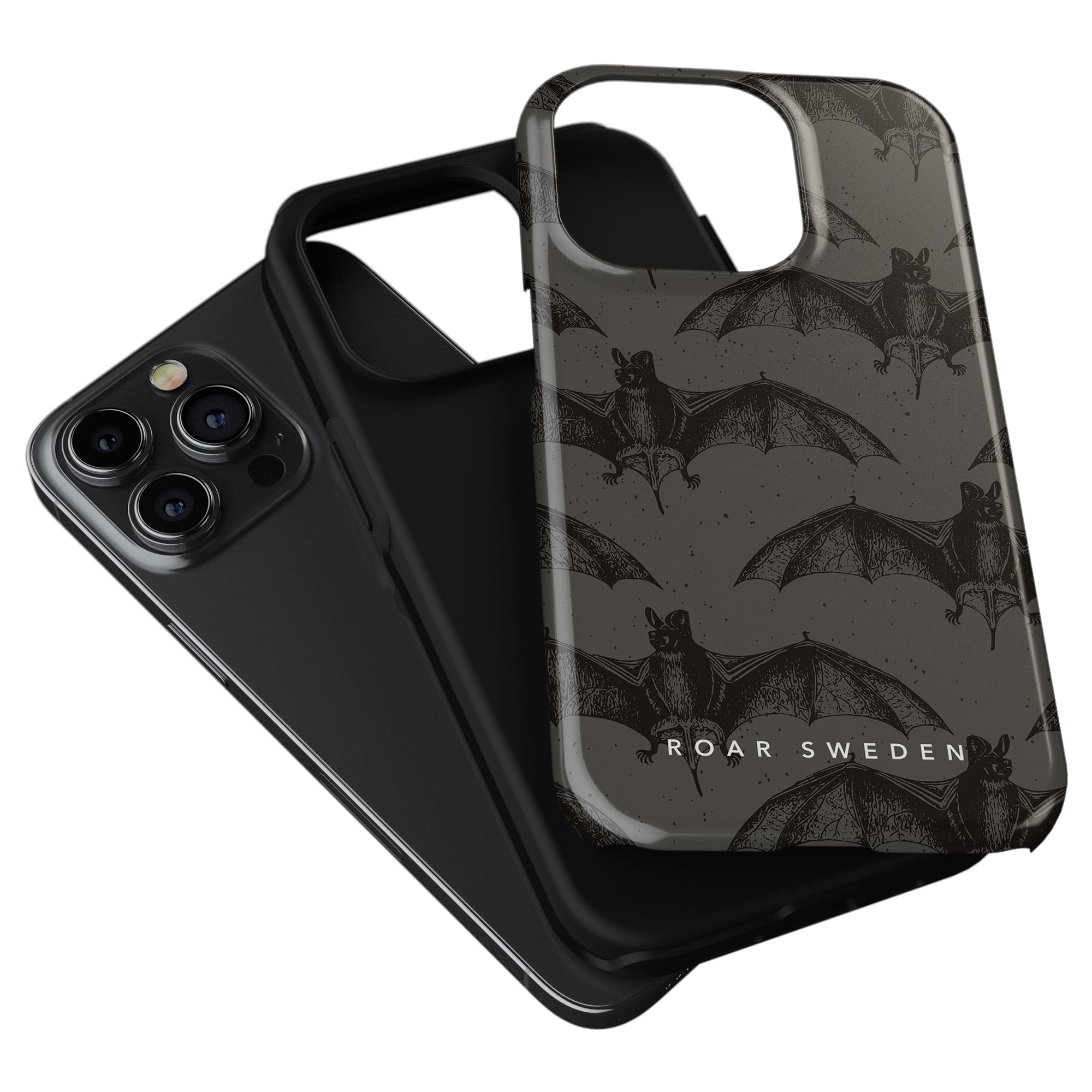 Two smartphone cases are displayed with a smartphone: one featuring a bat design and "ROAR SWEDEN" text, named "Bats - Tough case," and the other is plain black. These stylish mobilskal not only add flair but also provide excellent skydd för mobil.