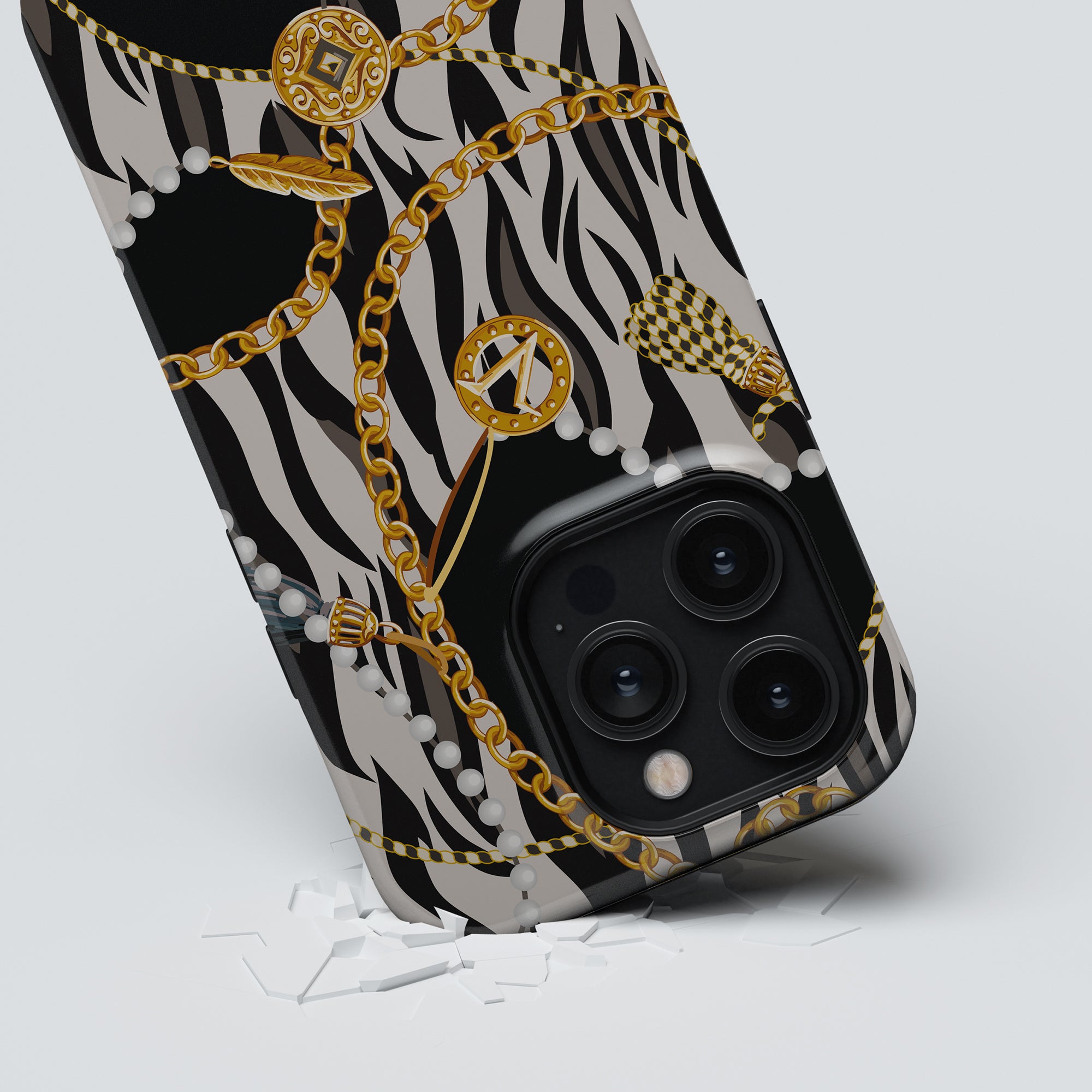 A Roar Swedens Bling - Tufft fodral med zebratryck och guldkedjor, vilket ger din smartphone ett lyxigt lyft.