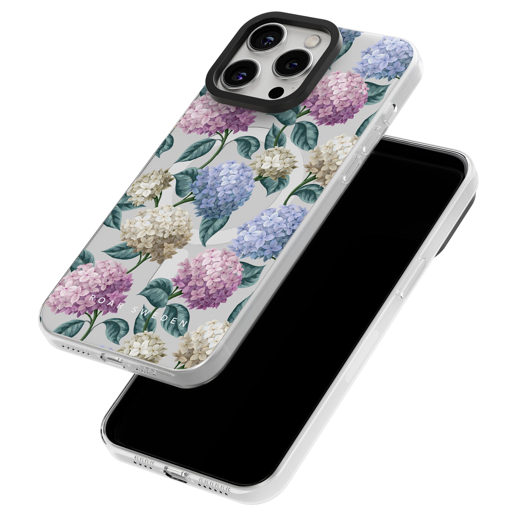 Two smartphone cases with hydrangea flower patterns are shown. One case is on a phone, displaying the back design, and the other is laid down, displaying the front. These **Hydrangea - MagSafe** cases are part of our elegant Floral Collection and seamlessly integrate with all your MagSafe accessories.