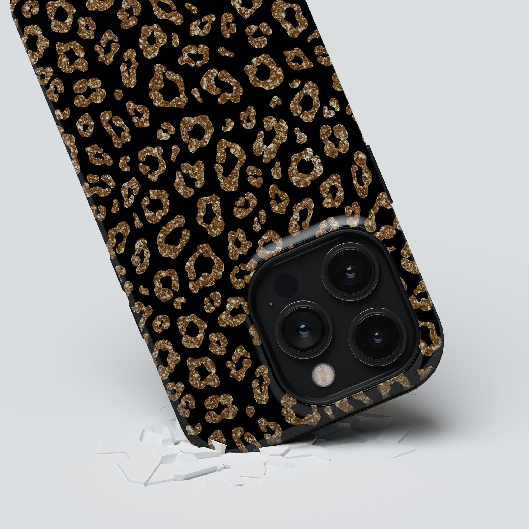 Ett trendigt Kitty Glitter Tough-fodral för iPhone 11, som ger en blandning av stil och skydd i en fantastisk design i svart och guld med leopardtryck.