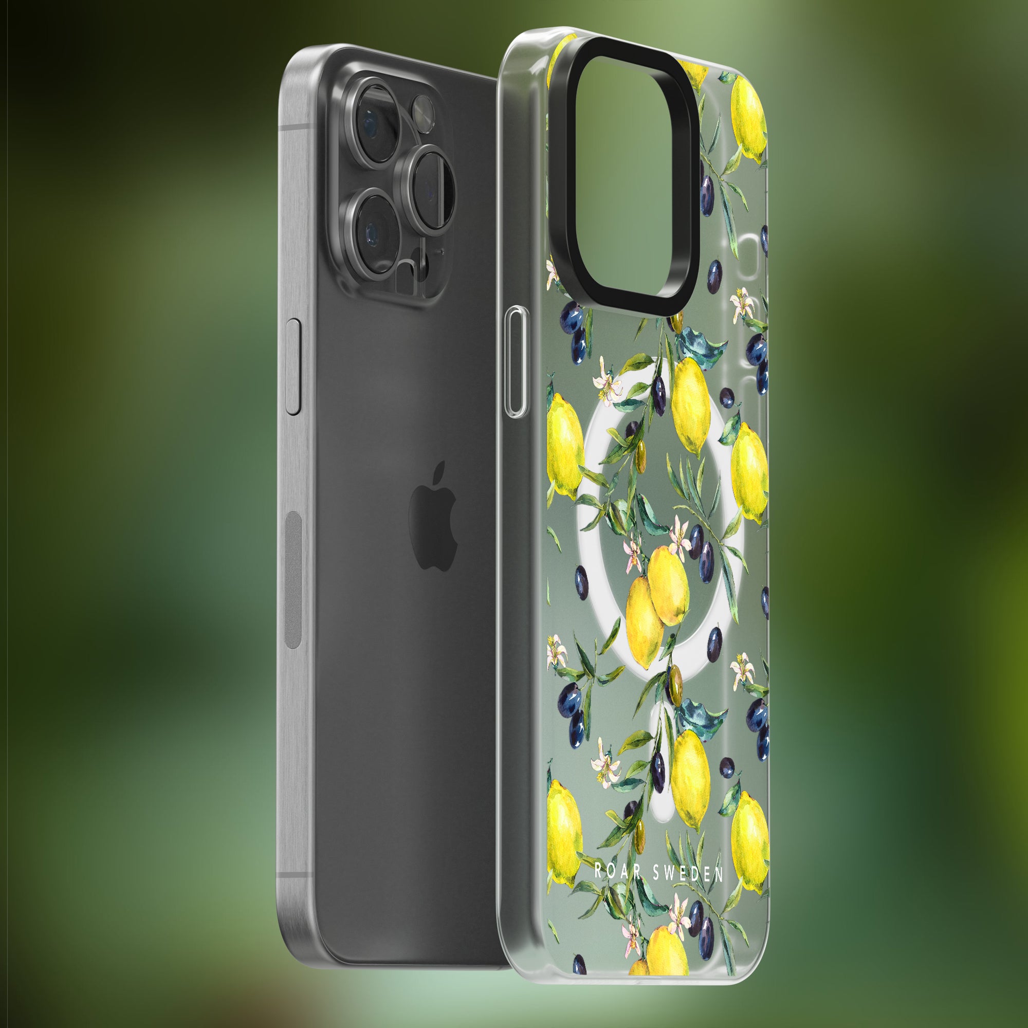 Two iPhones on a blurred green background; one is without a case, while the other boasts a charming Lemon Garden - MagSafe Case, adorned with lemons and olives.