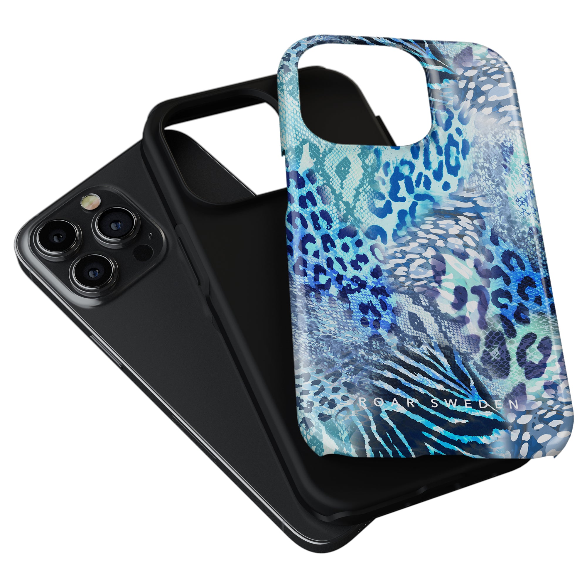 Two iPhone cases: one solid black and the other a vibrant Snow Leopard - Tough Case design with a blue and multicolor animal print pattern, both positioned near an iPhone with triple camera lenses. These tough cases provide stylish protection for your device.