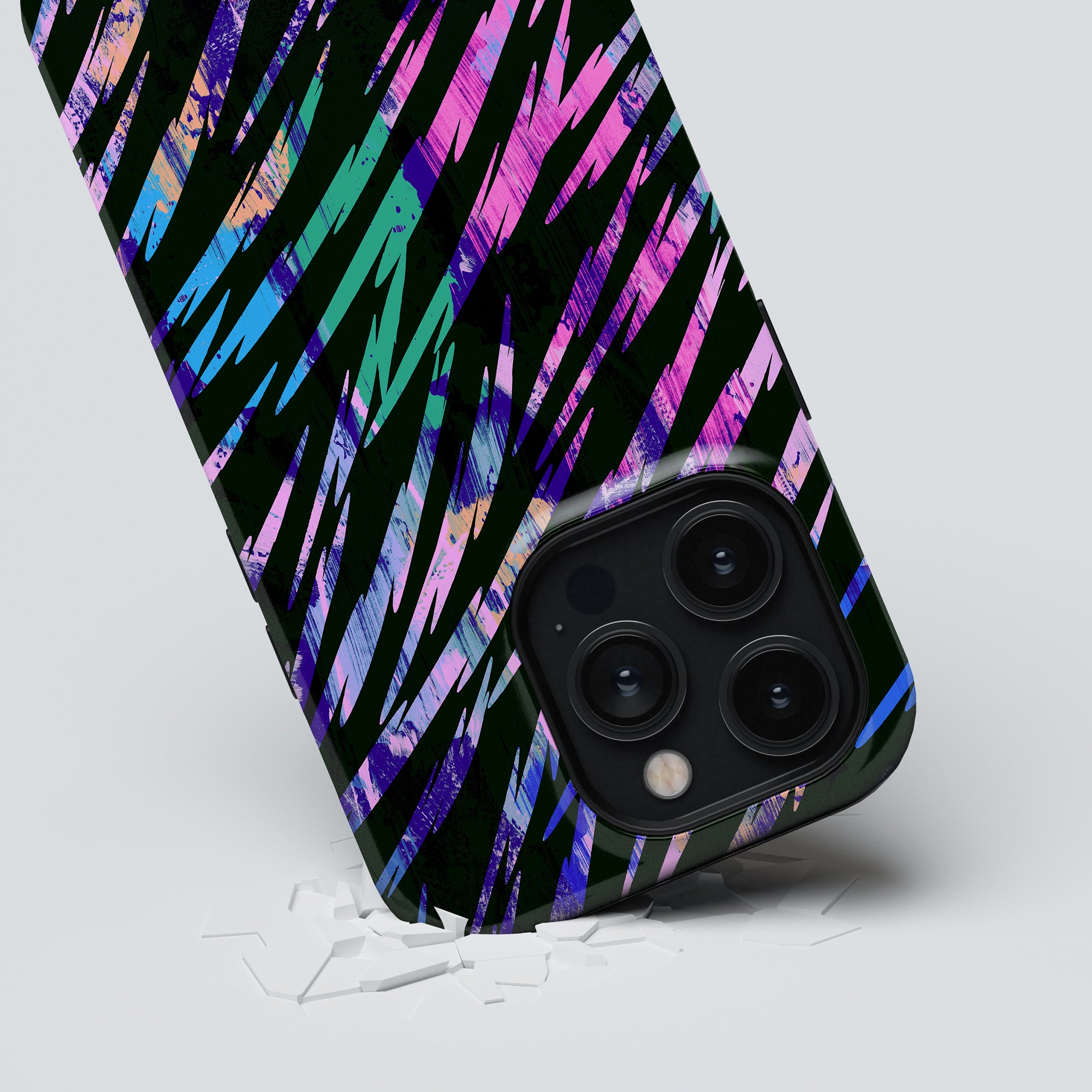 Rad Stripes - Tough Case with a colorful abstract design from the Exotic Collection partially breaking through a white surface.