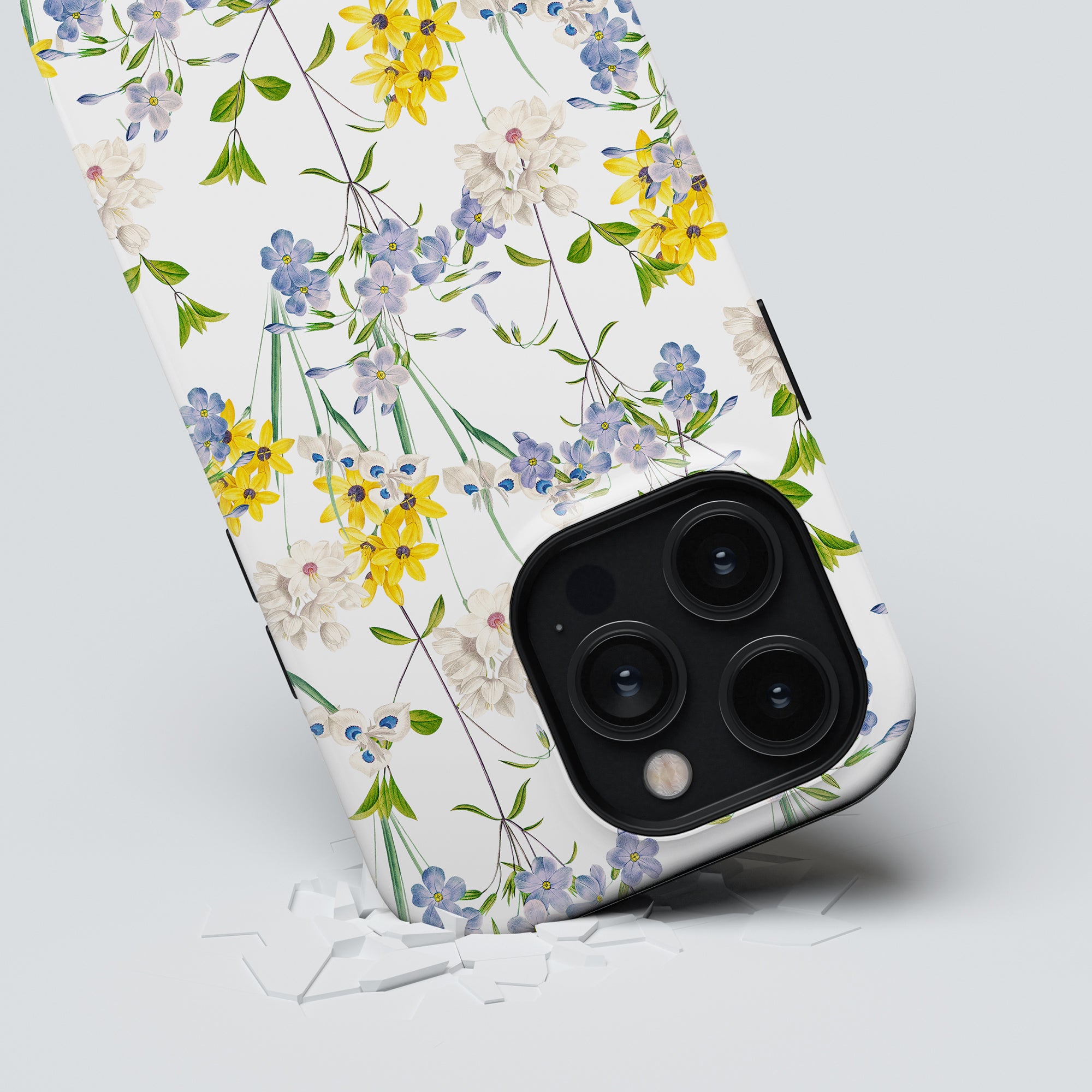 A smartphone with a Summer Flowers - Tough Case and wireless earbuds emerging through a solid surface.