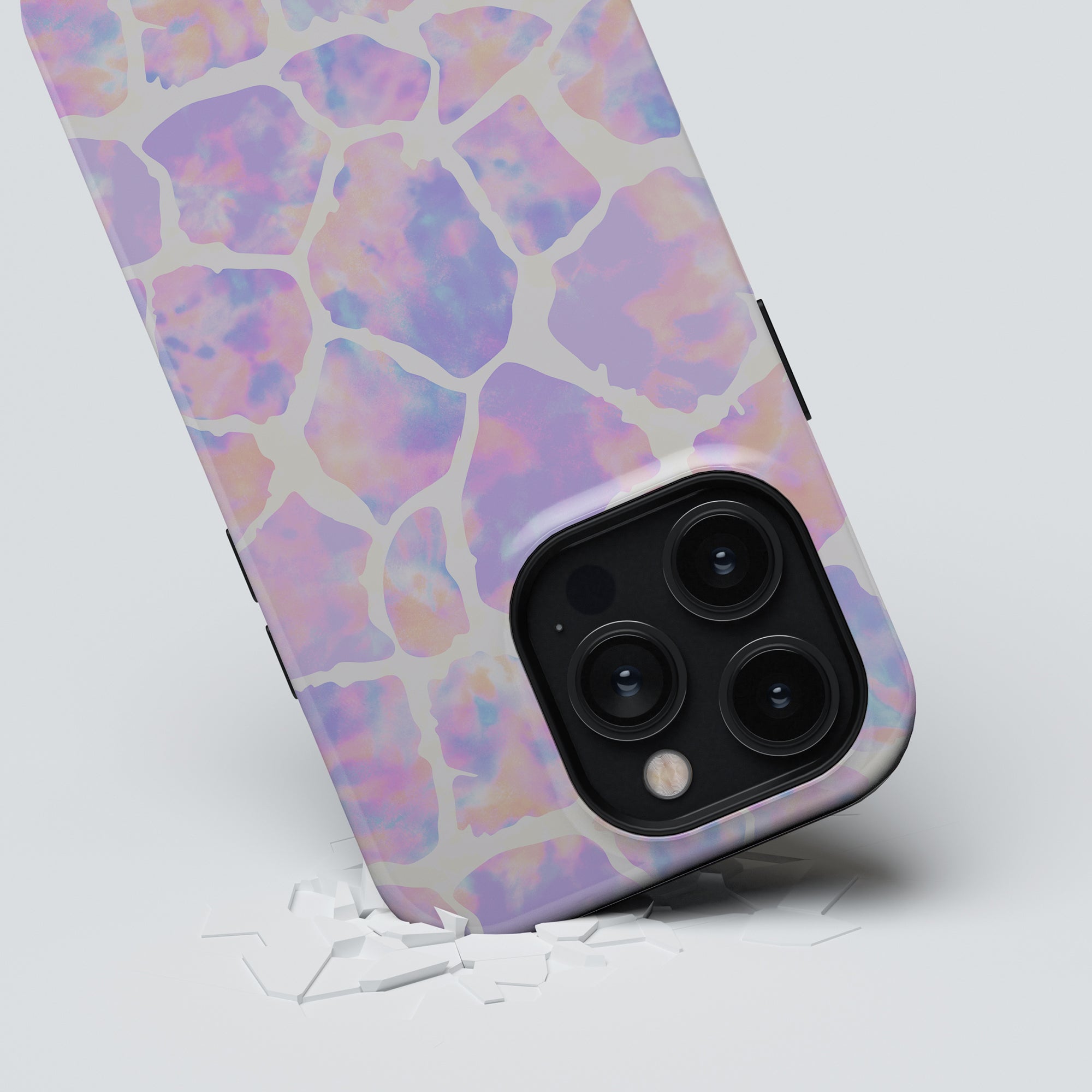 A Tie Dye Giraffe - Tough Case for the iPhone 11 that is both pink and purple.