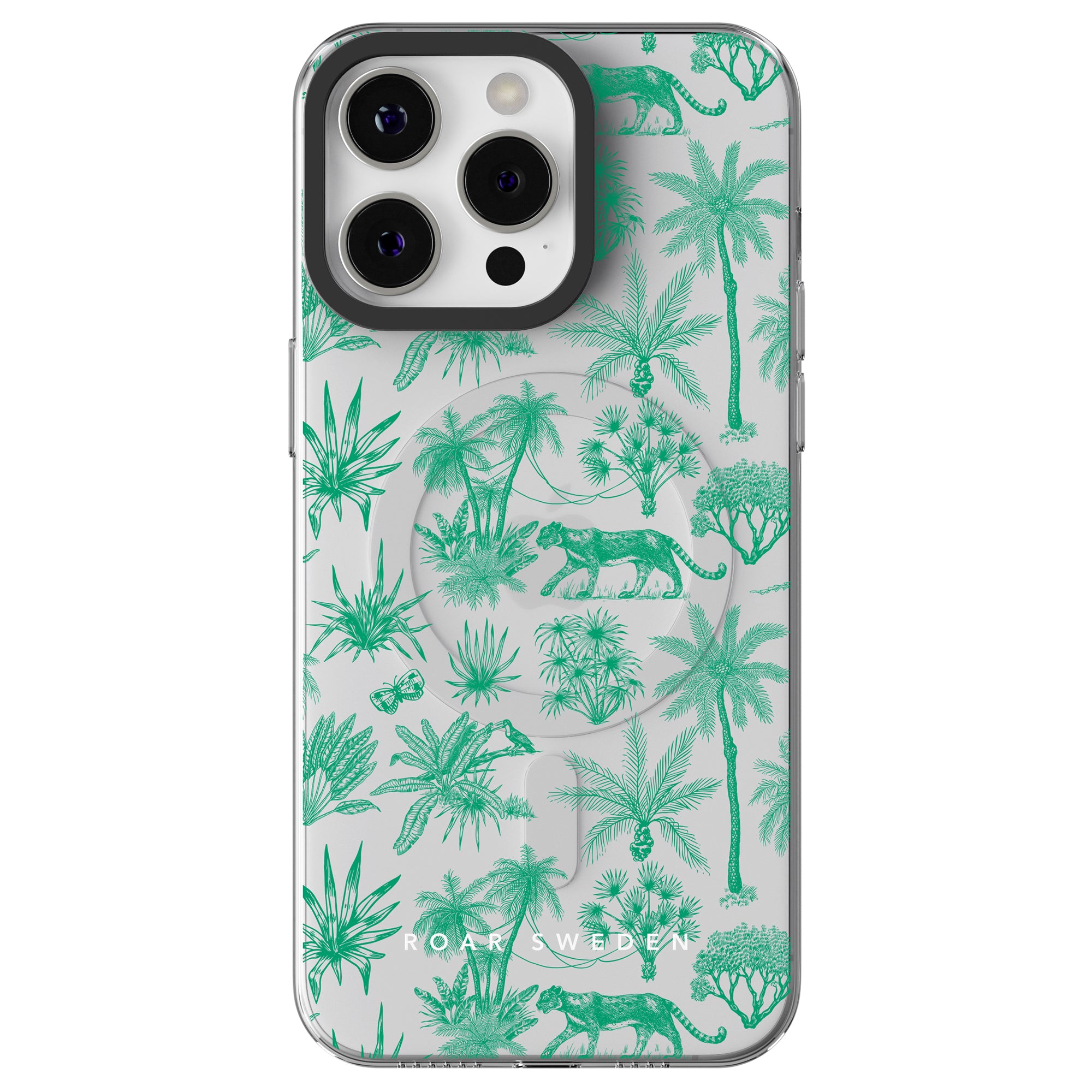 A tropical-themed iPhone case featuring green palm trees, plants, and wildlife illustrations with a touch of Toile De Jouy style. The camera module has three lenses and the case is MagSafe compatible. "Toile De Jouy Mint - MagSafe" is printed at the bottom, adding a unique flair.