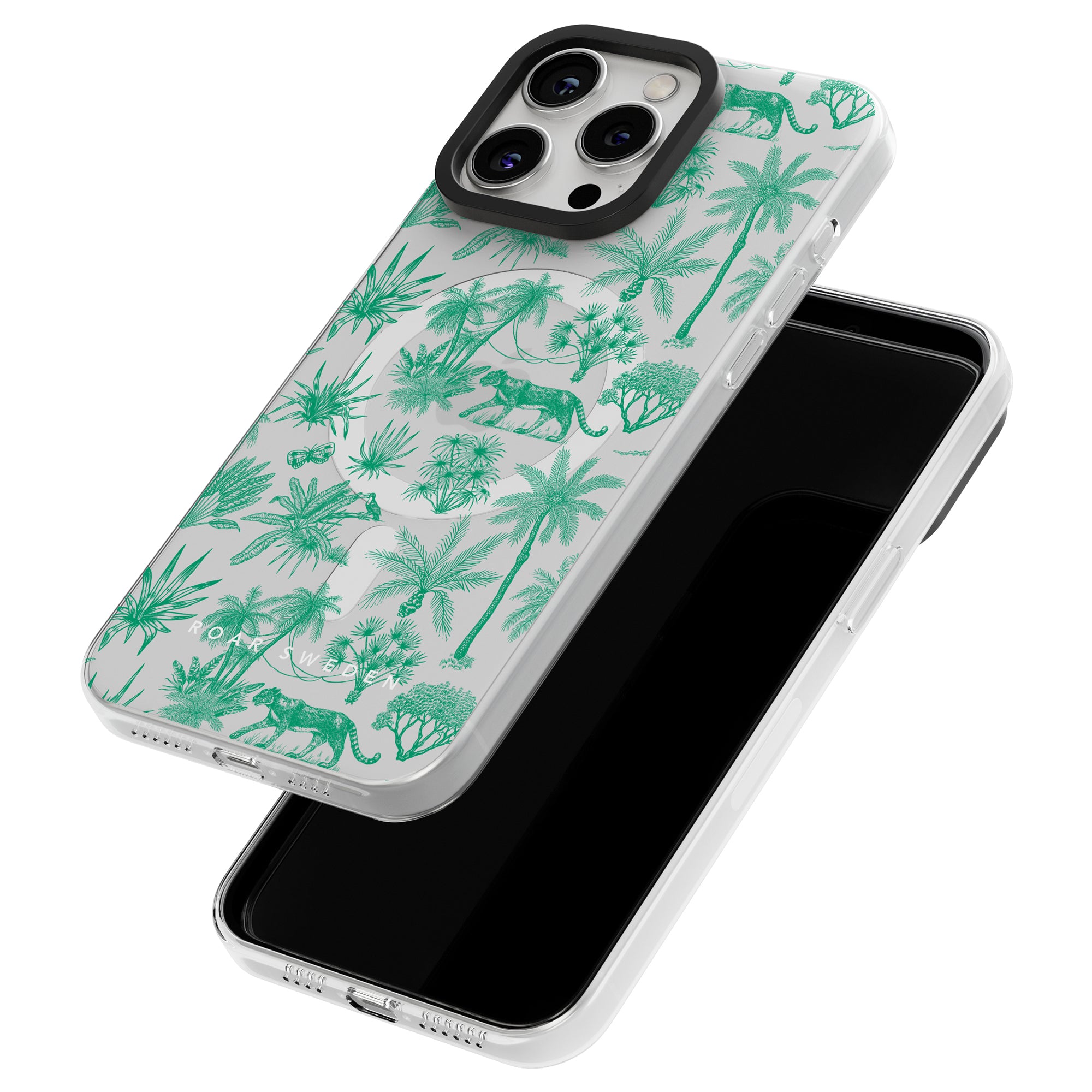 Two smartphones with identical jungle-themed green and white Toile De Jouy Mint - MagSafe cases featuring palm trees and wild animals. One phone is face up, showing the intricate case design, while the other is face down, displaying the screen with MagSafe compatibility.